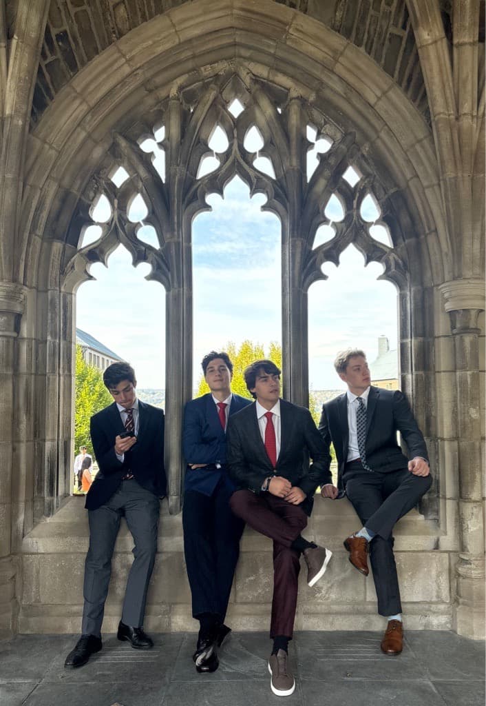CPEC members in suits on campus